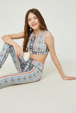 GY2657 Blue Girls Printed Border Stripe Active Sportsbra Sitting Pose