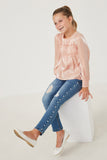 GY6372 BLUSH Girls Iridescent Ruffled Smock Cuff Top Pose